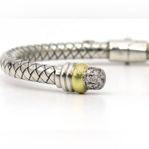 Silver and 18 Karat Yellow Gold
Basket Weave Bracelet With Pavé
Diamond End Caps